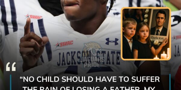 BREAKING NEWS: Jacksonville Jaguars star Travis Hunter was visibly shattered as he stood inside the candlelit chapel, watching Charlie Kirk’s two small children run toward their father’s portrait, calling out “Daddy” with heartbreaking innocence. A father himself, Hunter’s hands trembled as tears streamed down his face — the raw grief too much to contain. The entire hall seemed to freeze, every sob echoing louder in the silence. But what happened next — Hunter’s sudden, emotional act of solidarity — left the room in stunned silence, followed by uncontrollable weeping that swept through every mourner present.